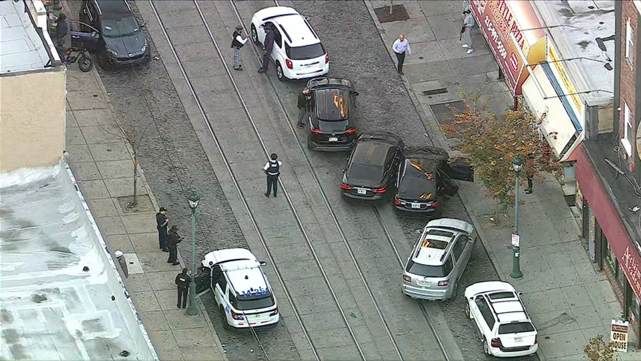 Police officer assisting at the scene of a car accident in Germantown